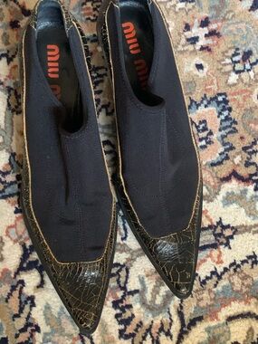 Miu Miu Black Pointed Slip-On Flats with Cracked Gold-Trim Toe